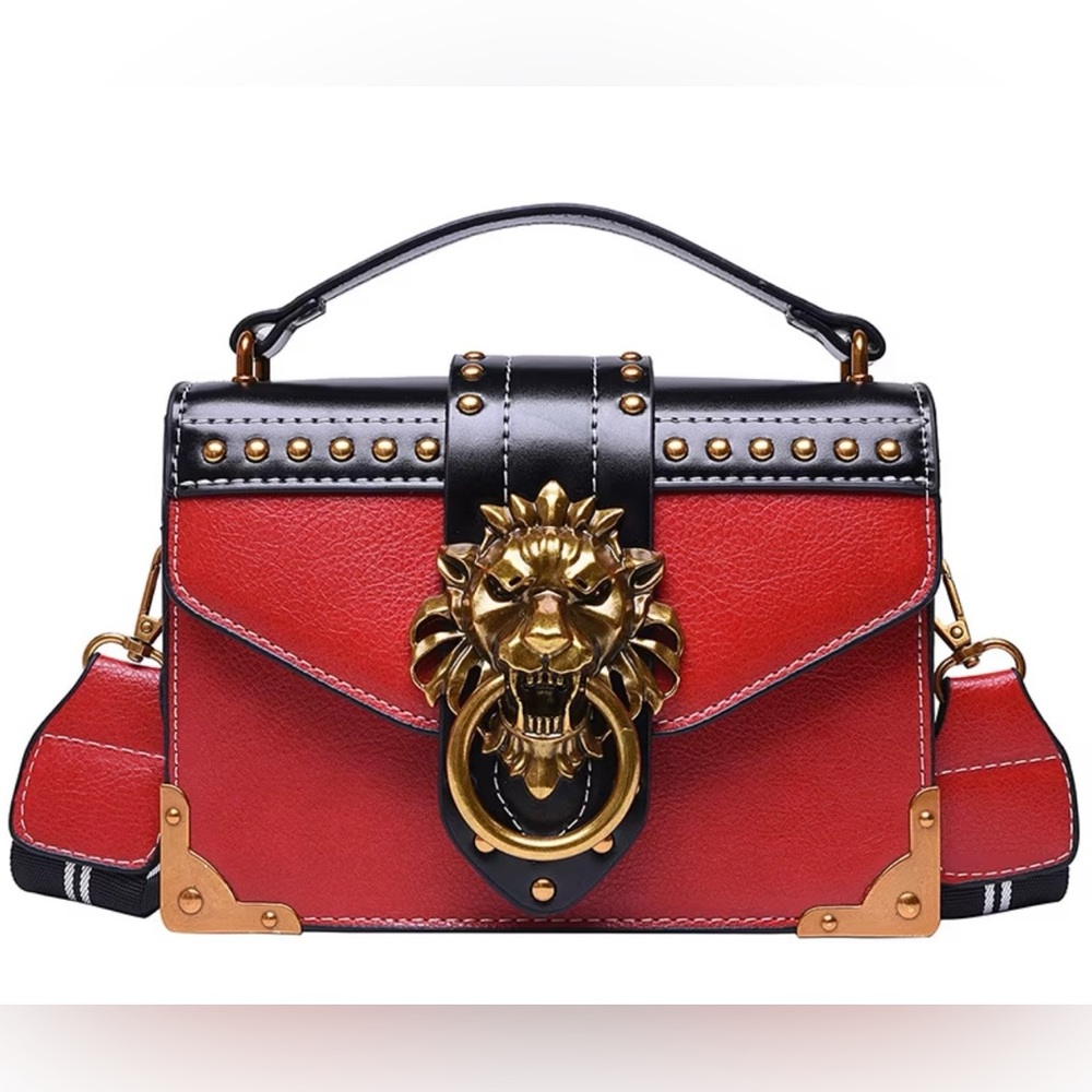 Elegant Red and Black Handbag with Lion Detail
